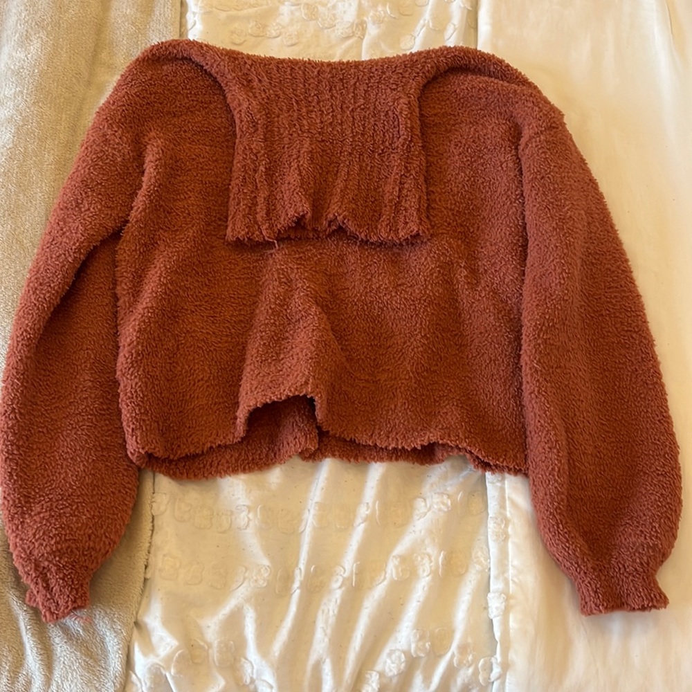 Orange turtleneck sweater